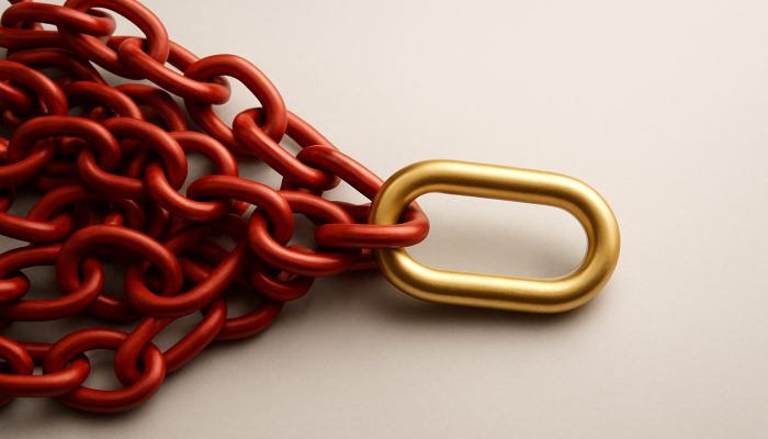 Illustration of tangled red debt chains merging into one golden payment link for consolidation